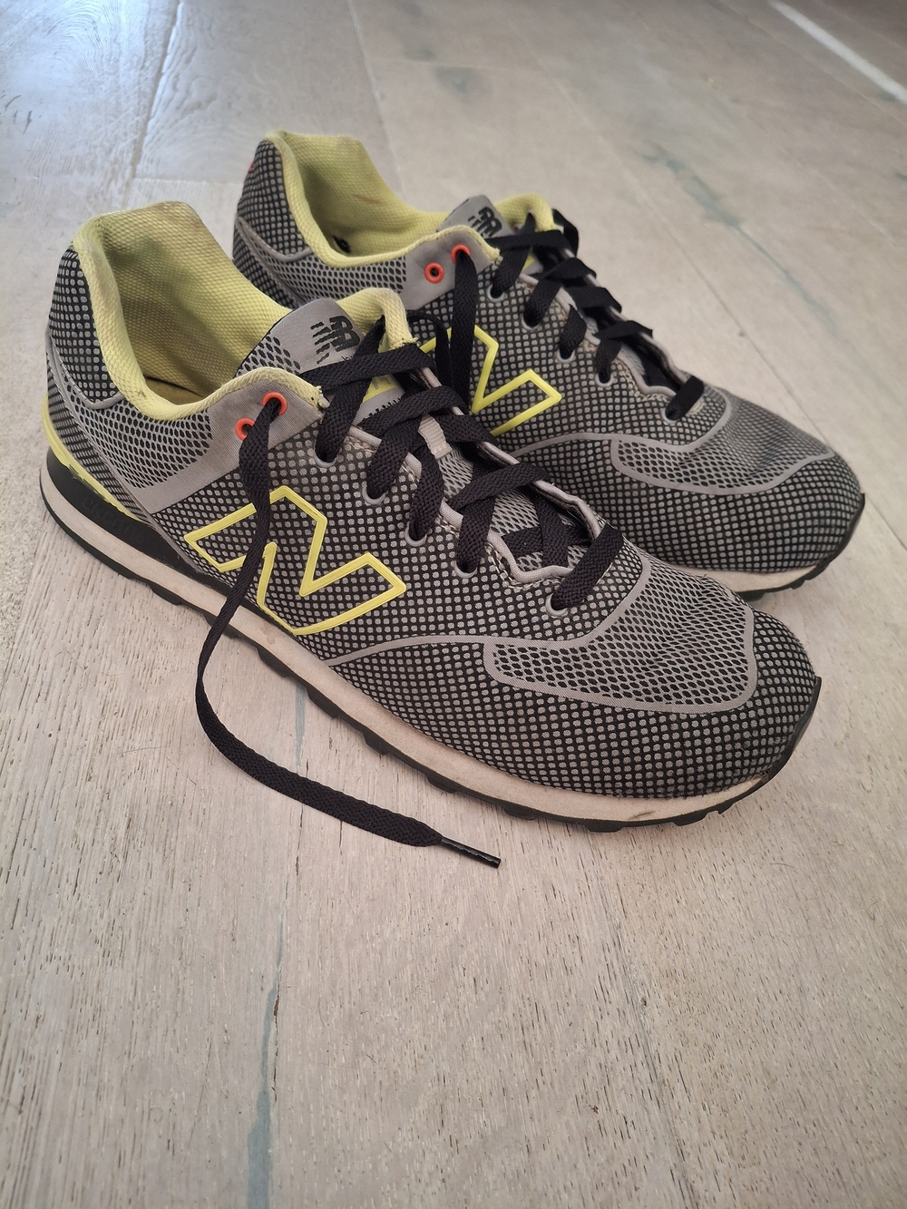 New Balance Men’s Woven Gray 574 Sneakers with Neon Yellow Accents